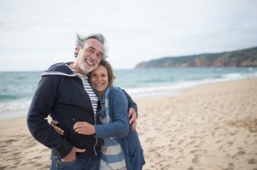 Tax efficient pension planning - couple on beach happy with their plans